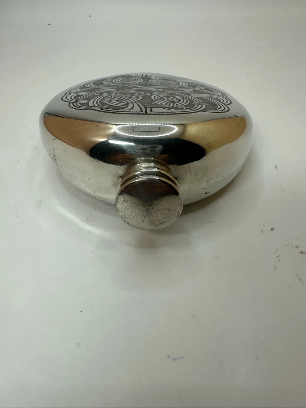Scottish Piper Pewter Flask with Celtic Knot Design.